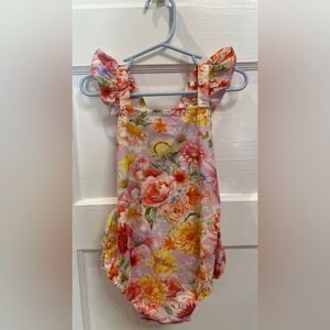 Posh Peanut floral ruffled bubble romper in the "Nala" print Size 18-24M